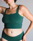 Organic cotton square neck bralette in lagoon dark green on model