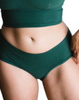 Front view of PROCLAIM Lagoon dark green organic cotton mid-rise brief underwear