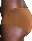 Side view of PROCLAIM Ella deep nude organic cotton mid-rise brief underwear