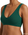 model wearing lagoon green everyday bralette front view