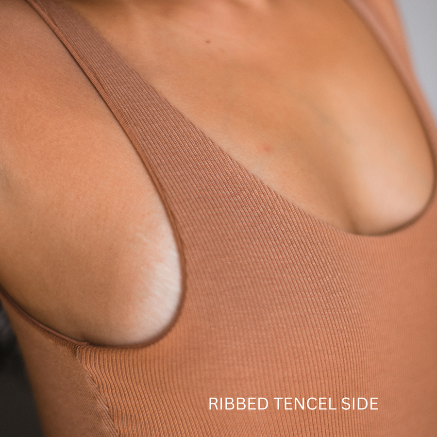 Close up of the ribbed side of the reversible bodysuit