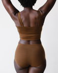 ella nude, a deep brown nude tone, high rise briefs rear view.