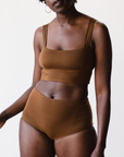 high rise ella nude, a rich brown tone, briefs in tencel, front view on model.