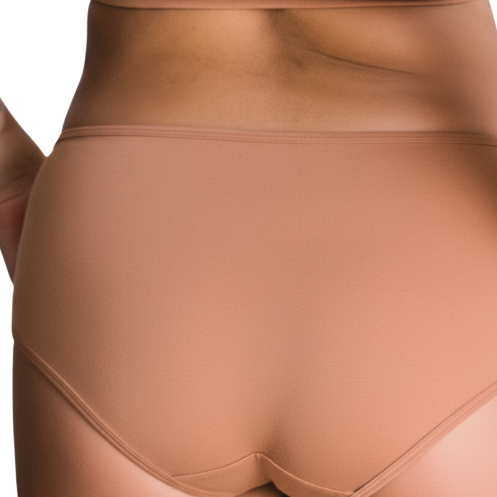 Back view of PROCLAIM Maya medium nude organic cotton mid-rise brief underwear, close up
