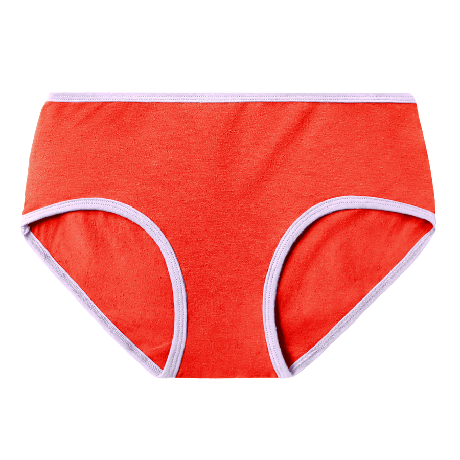 Poppy mid rise brief is a bright red tone with lilac, light purple contrast at the waist and leg openings. Has subtle hemp texture.