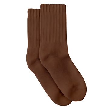 a pair of organic pima cotton crew socks that are ethically and sustainably made in Peru. In Ella, a warm brown tone.