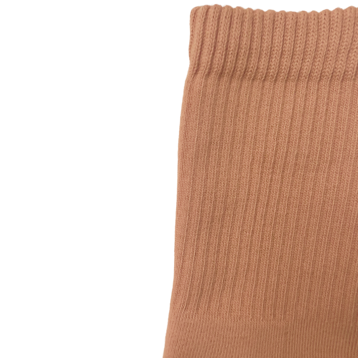 organic pima cotton crew socks ethically and sustainably made in Peru in Maya nude, a warm caramel tone. close up shows knitted sock texture of ribbing.
