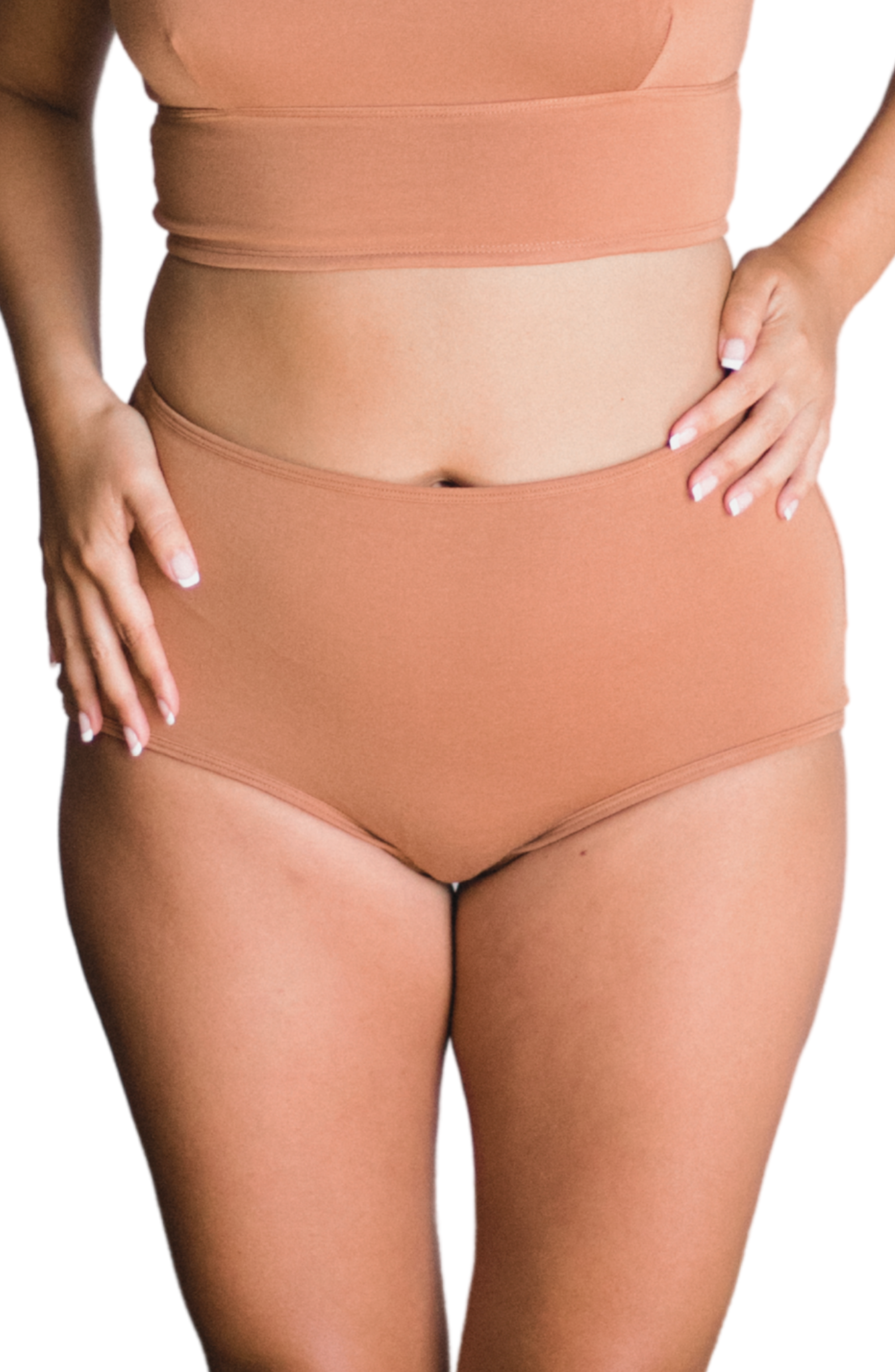 woman wearing proclaim high rise brief underwear in maya medium nude, front view on white backround