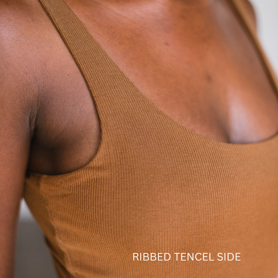 close up of the ribbed texture side of the reversible bodysuit