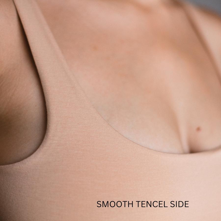 close up of the smooth side of the reversible bodysuit