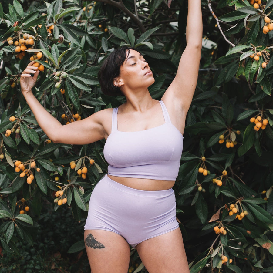 Proclaim Color Pop Collection Organic Cotton and Hemp Bralette in Lilac on Model wearing XL D-DDD Cup Bralette and XL High Rise Brief front view